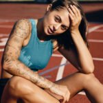 beautiful-wet-athlete-girl-with-tattoo-in-sportswe-HZ47DV3.jpg